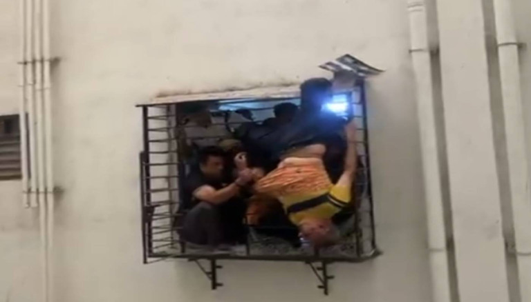 Miracle Escape in Surat: Man Survives Fall From 10th Floor After ...