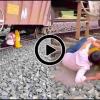 A Brush with Death: Viral Video of Couple Romancing Under Stationary Train Sparks Outrage Over Track Safety