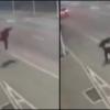 Miraculous Escape: Biker Lands on Feet After High-Speed Collision with Car
