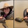 Woman Calmly Embraces Giant Green Anaconda in Amazon River, Video Sparks Widespread Reaction