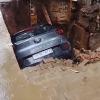 Heavy Rain Triggers Road Collapse in Ghaziabad, Car and Scooter Plunge into Deep Pit