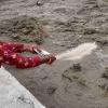 Nepali Woman Prayer Video Misidentified as Recent Flood Footage, Sparks Faith Debate