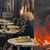 Paris Couple Sips Drinks as Fires Rage Nearby During Violent Protests