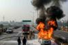 AGRA HIGHWAY SCARE: MOVING CAR BURSTS INTO FLAMES, ALL THREE OCCUPANTS ESCAPE UNHARMED
