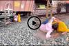 A Brush with Death: Viral Video of Couple Romancing Under Stationary Train Sparks Outrage Over Track Safety