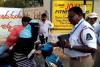 Burkha-Clad Woman Confronts Hyderabad Traffic Police Over Helmet Violation Amid Hospital Emergency Claim