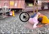 A Brush with Death: Viral Video of Couple Romancing Under Stationary Train Sparks Outrage Over Track Safety
