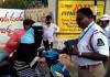 Burkha-Clad Woman Confronts Hyderabad Traffic Police Over Helmet Violation Amid Hospital Emergency Claim