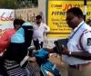 Burkha-Clad Woman Confronts Hyderabad Traffic Police Over Helmet Violation Amid Hospital Emergency Claim