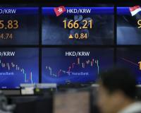 Stock market today: Asian shares slip in cautious trading following a weak close on Wall Street