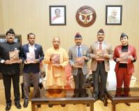 CM Yogi unveils flag pin, souvenir on Armed Forces Flag Day; expresses gratitude to soldiers