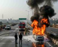 AGRA HIGHWAY SCARE: MOVING CAR BURSTS INTO FLAMES, ALL THREE OCCUPANTS ESCAPE UNHARMED