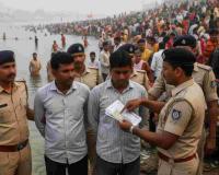 Security Breach at Sangam: Two Apprehended with Forged Documents and Counterfeit Currency