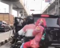 Brazen Civic Disregard on NH-8: SUV Driver Sparks Outrage After Stopping to Urinate in Mid-Traffic