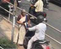 Traffic Vigilante: Elderly Kerala Woman Forces Rule-Breaking Motorist off Pedestrian Path