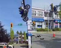 Motorcycle Collision Sends Bike Airborne, Leaves It Hanging From Traffic Signal in Canada Intersection Chaos