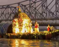 Floral Float Procession Illuminates Hooghly River Beneath Howrah Bridge Amid Cultural Celebrations in Kolkata