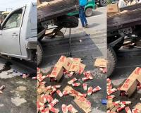 =Pickup Truck Carrying Illicit Liquor Crashes in Saran, Hundreds of Tetra Packs Spill Across Road; Smugglers Flee