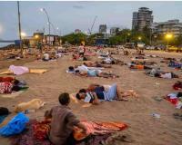 Mumbai Heatwave Forces Slum Families to Take Shelter on Versova Beach Amid Severe Power Cuts