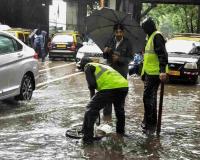 Mumbai Braces for Intensifying Monsoon as Heavy Rain Triggers Flooding and Traffic Disruptions