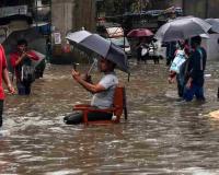 Mumbai on High Alert as Intense Monsoon Rains Trigger Red Warning, Flooding, and Transport Disruptions