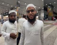 Woman Challenges Rose Petal Welcome for Hajj and Umrah Pilgrims at Indian Airport