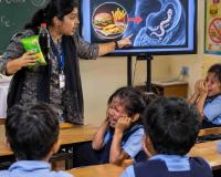 Indian Teacher’s Junk Food Scare Tactics Trigger Debate Over Classroom Methods