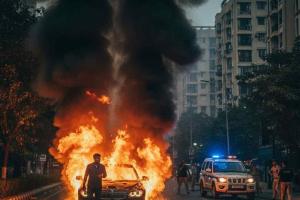 Fierce Blaze Engulfs Moving BMW in Noida, Driver Escapes in Time