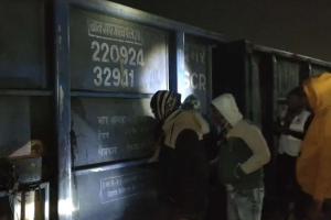 Fire Brigade Thwarts Potential Disaster as Smoke Billows from Coal Freight Train in Prayagraj