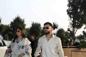 Coordinated in White: Virat Kohli and Anushka Sharma Make a Stylish Exit from Mumbai