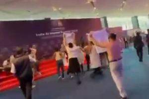 Political Storm Hits Global AI Summit as Youth Congress Stages Topless Protest at Bharat Mandapam