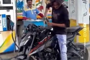 Man Washes Bike with Petrol at Fuel Station, Viral Video Sparks Outrage Over Waste and Safety Risks