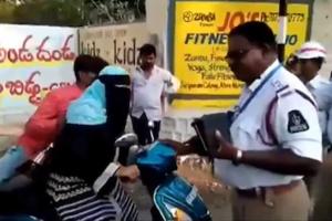 Burkha-Clad Woman Confronts Hyderabad Traffic Police Over Helmet Violation Amid Hospital Emergency Claim