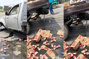 =Pickup Truck Carrying Illicit Liquor Crashes in Saran, Hundreds of Tetra Packs Spill Across Road; Smugglers Flee